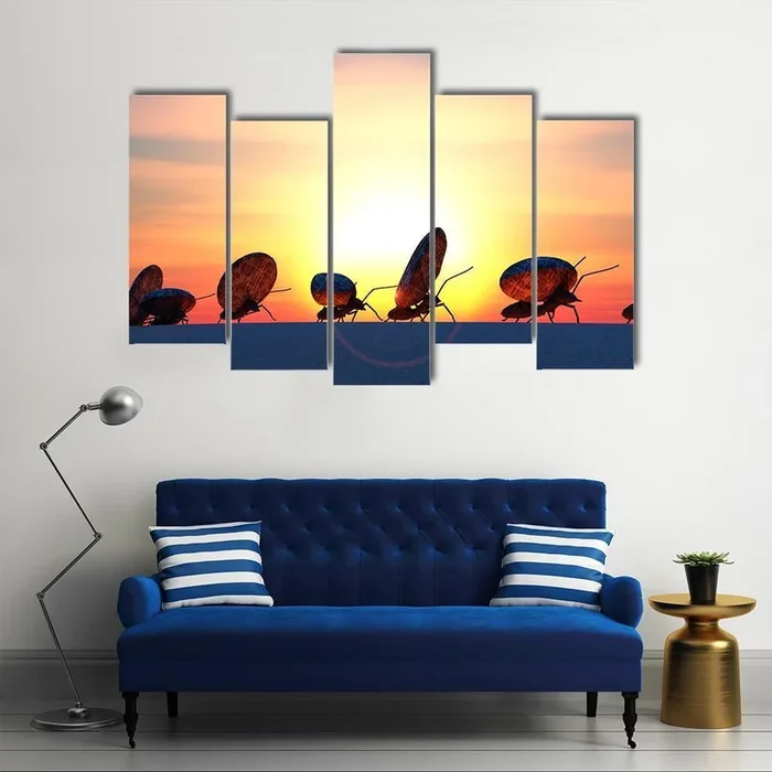 Ants Carrying Large Round Stones at Sunset Canvas Wall Art