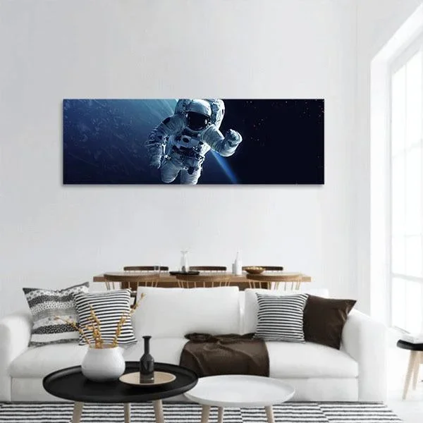 Astronaut In Space Panoramic Canvas Wall Art
