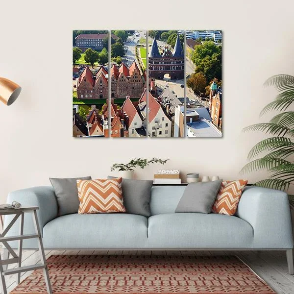 View Of Salzspeicher And Holstentor Gate In Lubeck Canvas Wall Art