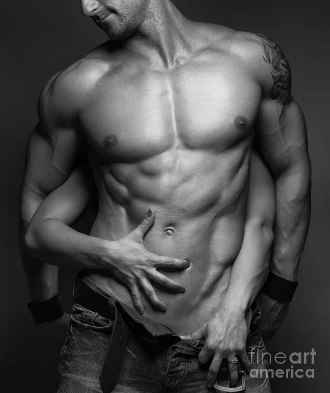 Woman hands touching muscular man’s body